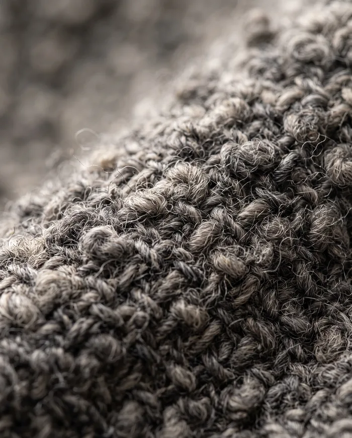 Macro of woven wool bouclé fabric